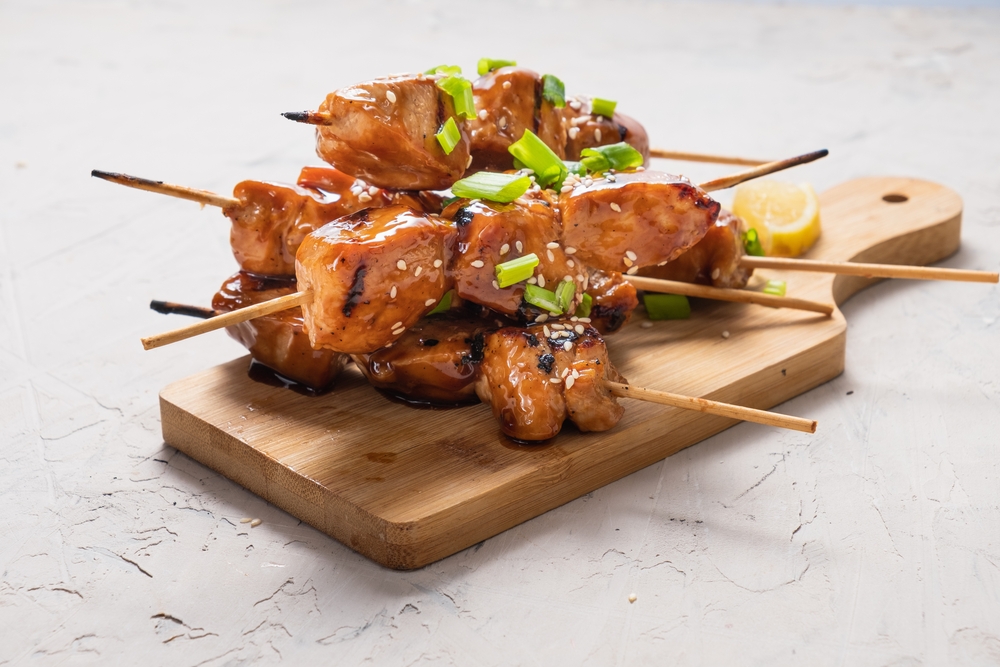 Chicken,Fillet,Yakitori,On,A,White,Table.,Appetizing,Slices,Of