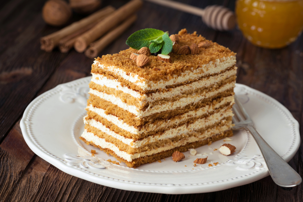 Slice,Of,Layered,Honey,Cake,Russian,Medovik,Decorated,With,Mint